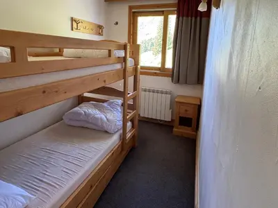 Un ou plusieurs lits dans un hébergement de l'établissement Appartement 6 pers. ski aux pieds - Animaux admis - FR-1-181-2808