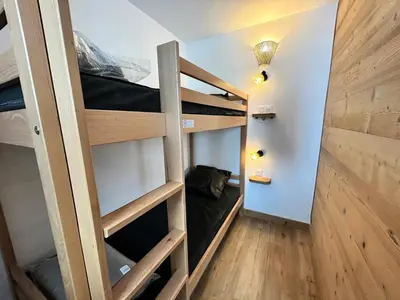 Un ou plusieurs lits superposés dans un hébergement de l'établissement Résidence Hameau Du Borsat 1& 2 - Studio cabine rénové·Pied des Pistes·Balcon MAE-9311