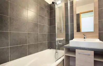 Salle de bains dans l'établissement Résidence La Licorne - maeva Home - Appartement 2 pièces 4 personnes - Confort MAE-9961