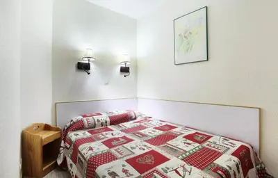Un ou plusieurs lits dans un hébergement de l'établissement Résidence La Licorne - maeva Home - Appartement 3 pièces 6 personnes - Confort MAE-9971