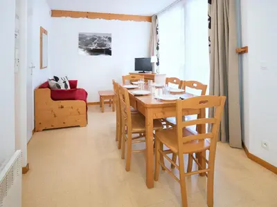 Télévision ou salle de divertissement dans l'établissement Family apartment with balcony