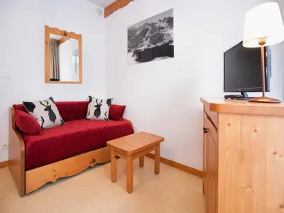 Télévision ou salle de divertissement dans l'établissement Family apartment with balcony