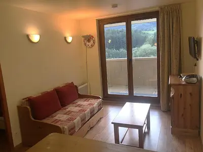 Télévision ou salle de divertissement dans l'établissement Apartment in Val Cenis near Arc River