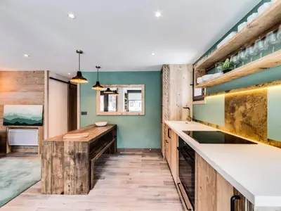 Cuisine ou kitchenette dans l'établissement Résidence Val D'isere Village - Appartement entièrement rénové Aux pieds des pistes Parking couvert MAE-3083
