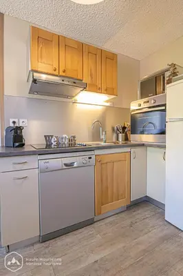 Cuisine ou kitchenette dans l'établissement Les Chalets De La Pyramide - CH2 - LES CHALETS DE LA PYRAMIDE MAE-0793