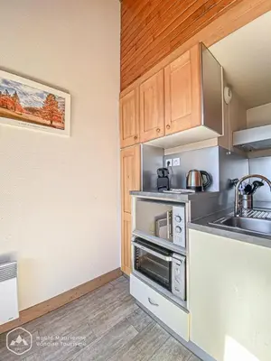Cuisine ou kitchenette dans l'établissement Les Chalets De La Pyramide - CH7 - LES CHALETS DE LA PYRAMIDE MAE-1053