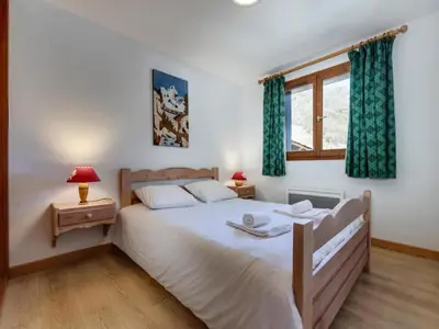 Un ou plusieurs lits dans un hébergement de l'établissement Résidence Rond Point Des Pistes - Appartement confortable Ski aux pieds Balcon MAE-2923