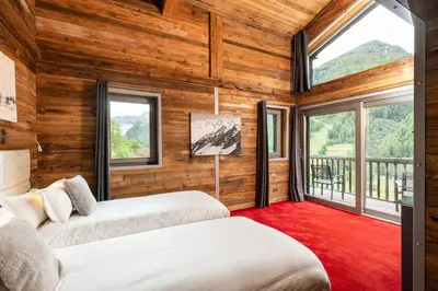 Un ou plusieurs lits dans un hébergement de l'établissement Black Diamond - Chalet Charlie
