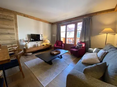 Coin salon dans l'établissement Premium 5 étoiles Appartement Arc 1950 Ski aux pieds piscine sauna fitness