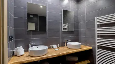 Salle de bains dans l'établissement Chalet Hugo by Les Etincelles
