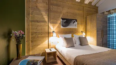 Un ou plusieurs lits dans un hébergement de l'établissement Chalet Violette by Les Etincelles