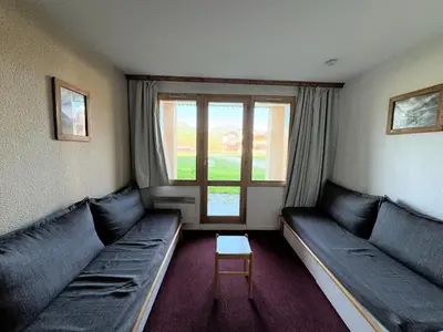 Coin salon dans l'établissement Résidence Themis - Appartement fonctionnel · Skis aux pieds · Vue pistes · Rez-de-chaussée MAE-3761