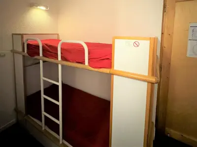 Un ou plusieurs lits superposés dans un hébergement de l'établissement Résidence Themis - Appartement fonctionnel · Skis aux pieds · Vue pistes · Rez-de-chaussée MAE-3761