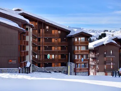 L'établissement Appartement cosy avec accès pistes, casier à skis et parking souterrain - FR-1-181-2036 en hiver