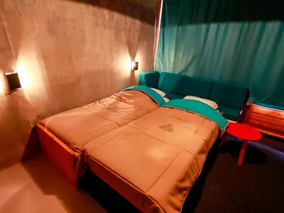 Un ou plusieurs lits dans un hébergement de l'établissement Studio confortable skis aux pieds avec balcon - FR-1-346-350
