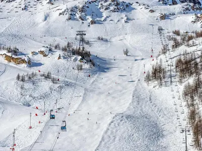 L'établissement Appartement rénové skis aux pieds avec parking et wifi à Val-d'Isère - FR-1-694-280 en hiver