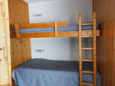 Un ou plusieurs lits dans un hébergement de l'établissement Résidence Nova - Appartement 2 pièces 6 personnes proche des pistes, des commerces, de la garderie et de l'ESF au centre de la station d’Arc 1800 MAE-6744