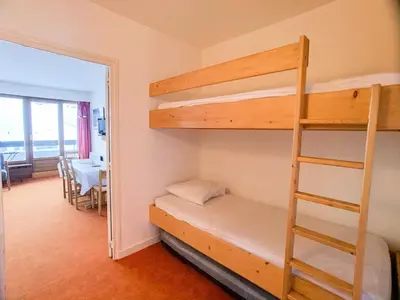 Un ou plusieurs lits dans un hébergement de l'établissement Résidence Bec Rouge - Appartement lumineux·Skis aux pieds·Balcon MAE-6744